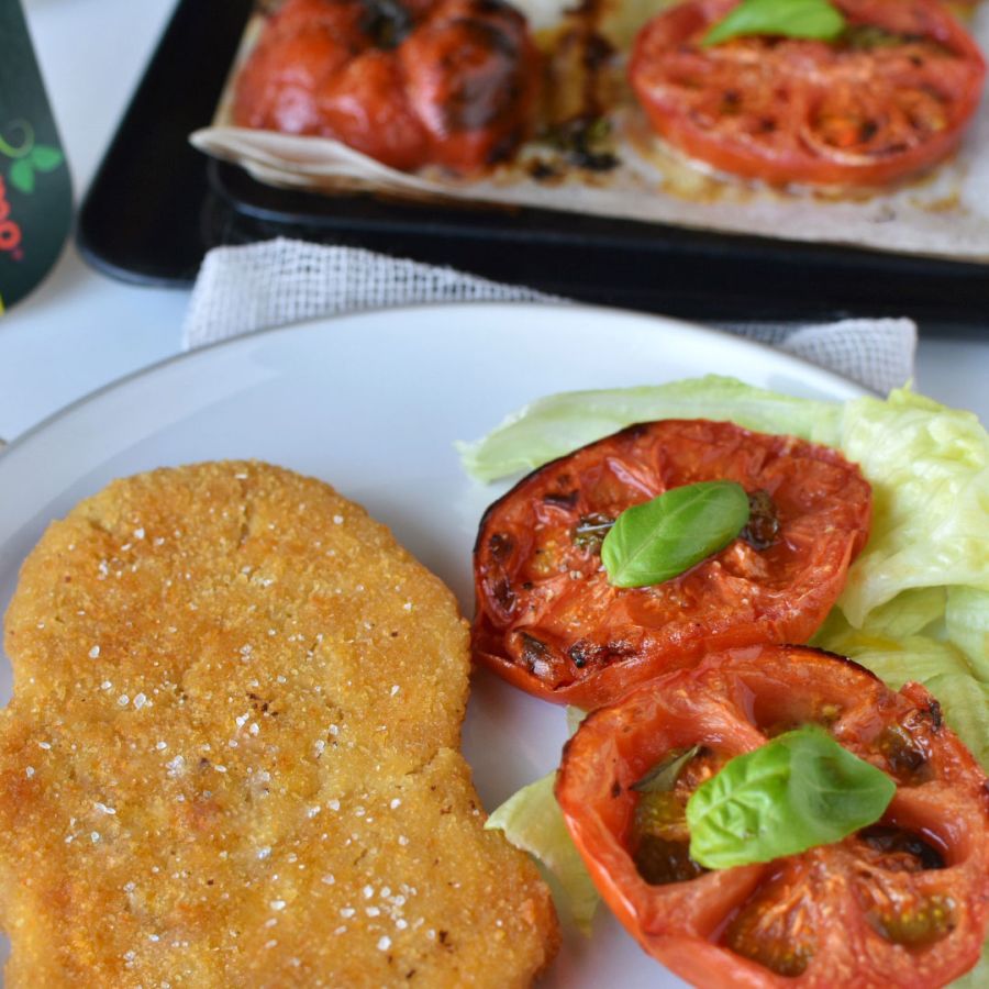 Cotoletta veg con pomodori al forno