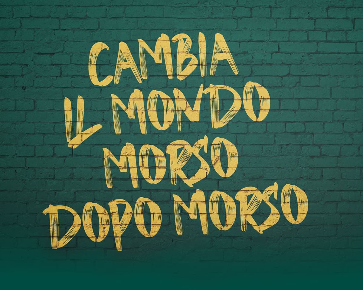 Immagine di sfondo con testo Cambia il mondo morso dopo morso
